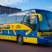 The magicall mystery tour bus parked up on the albert dock